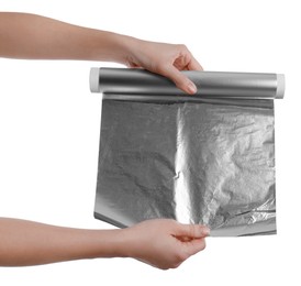 Photo of Woman holding roll of aluminum foil on white background, closeup