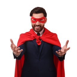 Photo of Happy businessman wearing red superhero cape and mask on white background