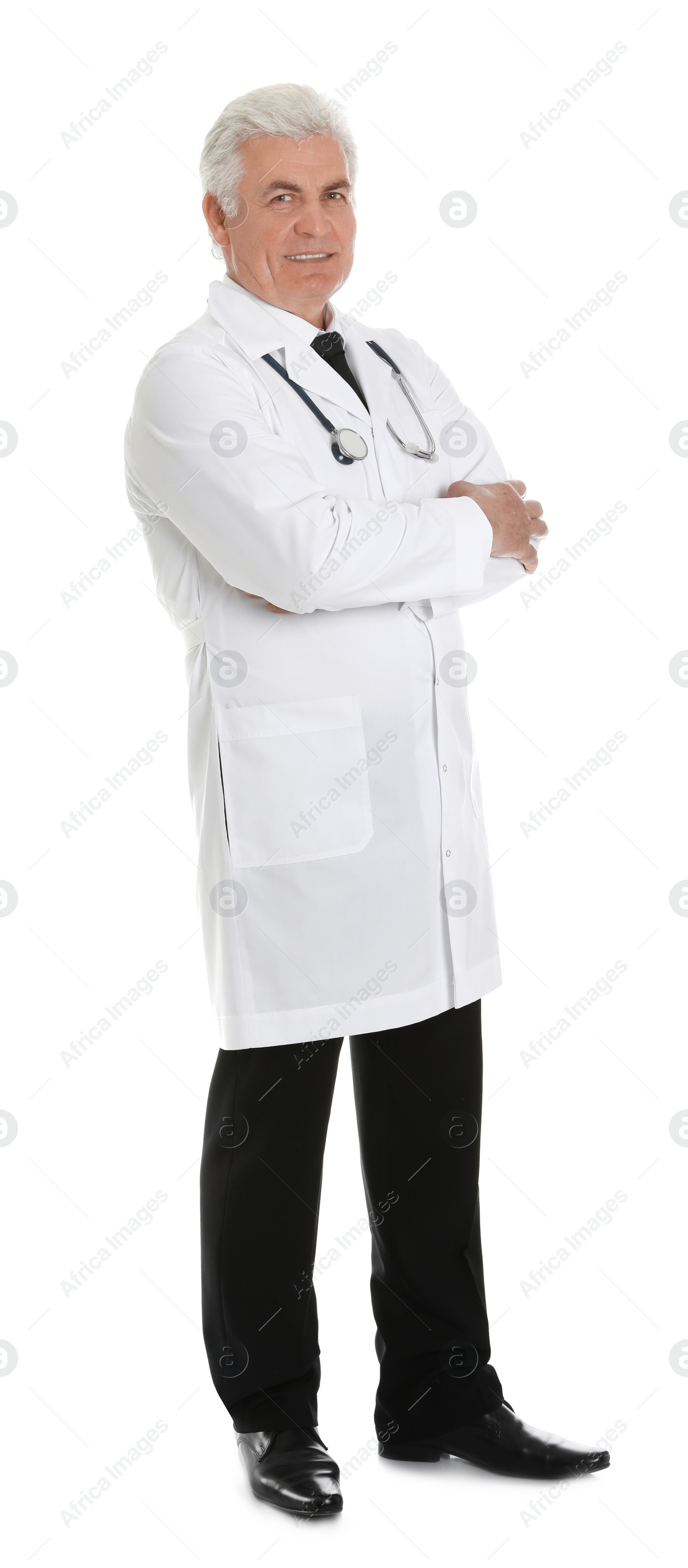 Photo of Full length portrait of male doctor with stethoscope isolated on white. Medical staff