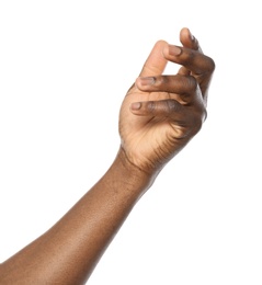 African-American man holding something in hand on white background, closeup