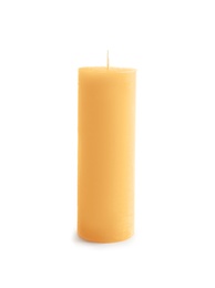 Photo of Yellow pillar wax candle on white background