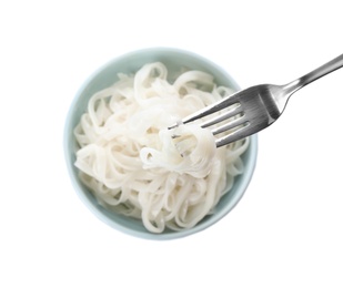 Photo of Fork with rice noodles over bowl on white background, top view