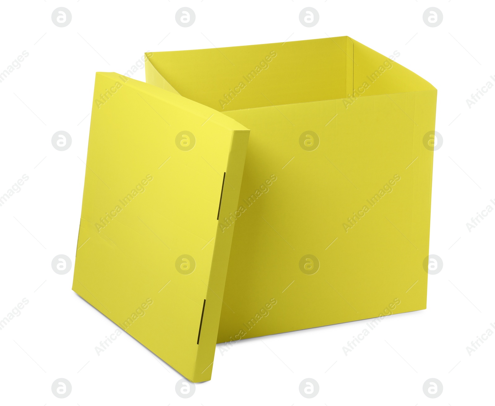 Photo of Yellow gift box with cap isolated on white