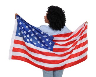 4th of July - Independence day of America. Woman holding national flag of United States on white background, back view