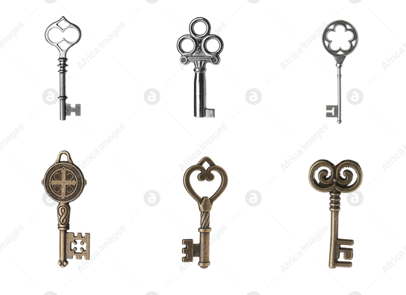 Image of Set of different ornate keys on white background