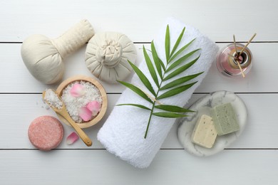 Photo of Flat lay composition with different spa products on white wooden table