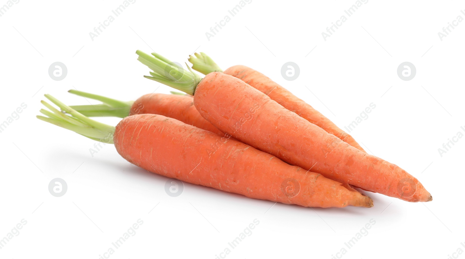 Photo of Fresh ripe carrots on white background. Wholesome vegetable