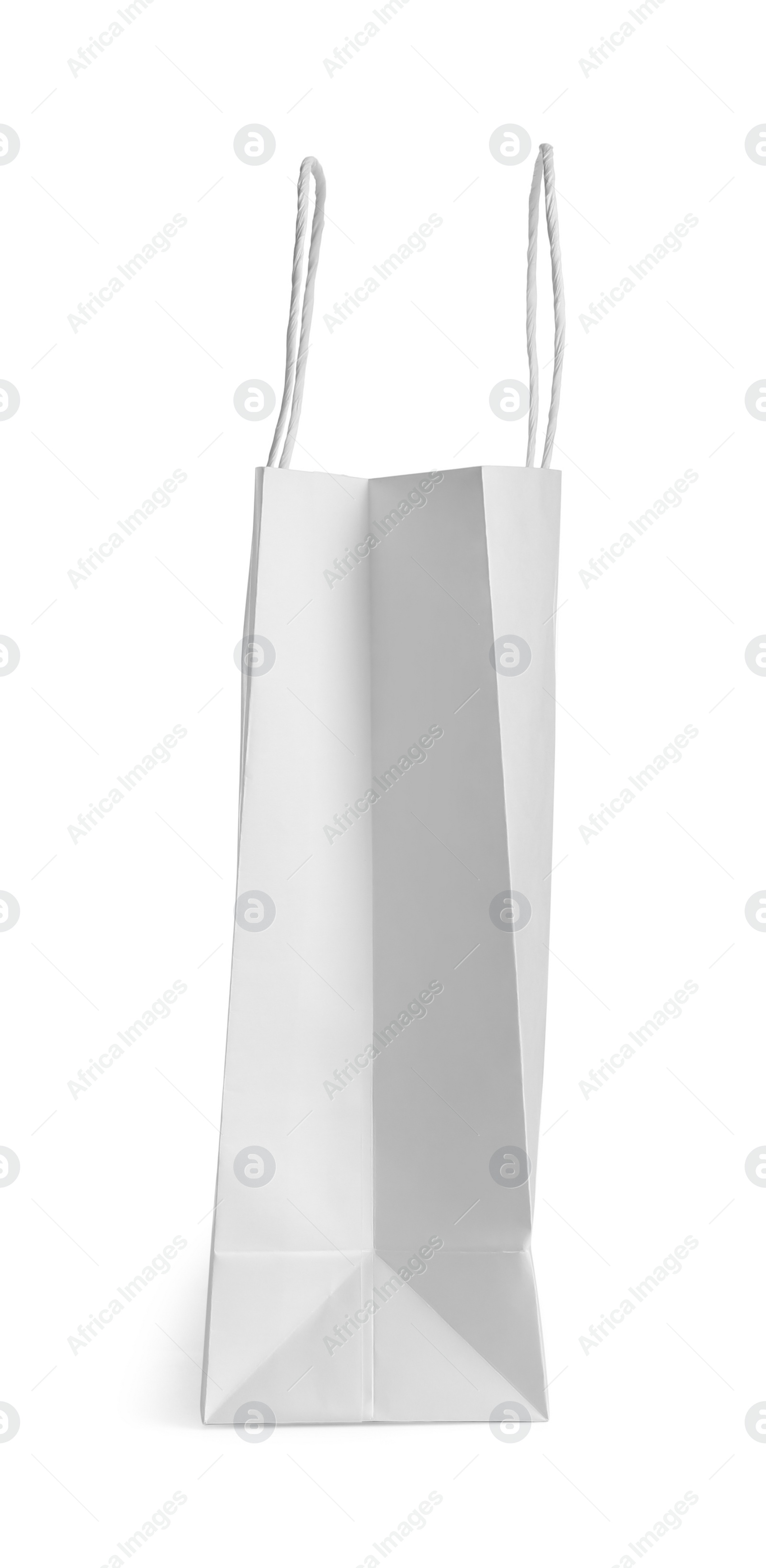 Photo of One paper bag isolated on white. Mockup for design