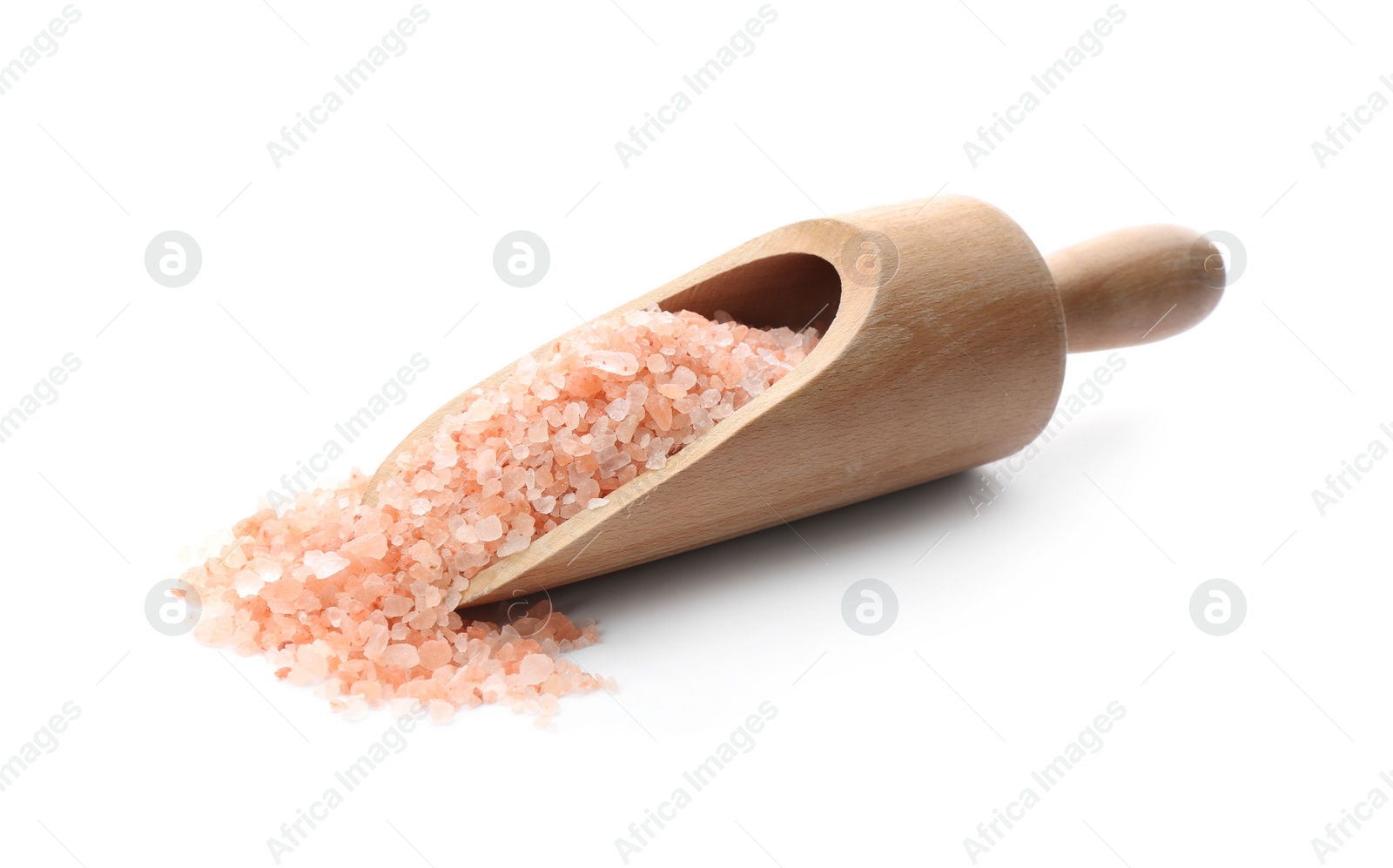 Photo of Wooden scoop with pink himalayan salt isolated on white