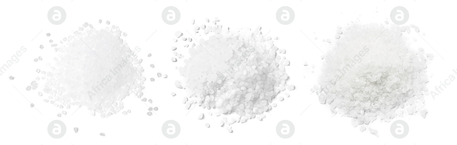 Image of Set with piles of natural salt isolated on white, top view