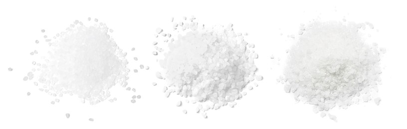 Set with piles of natural salt isolated on white, top view