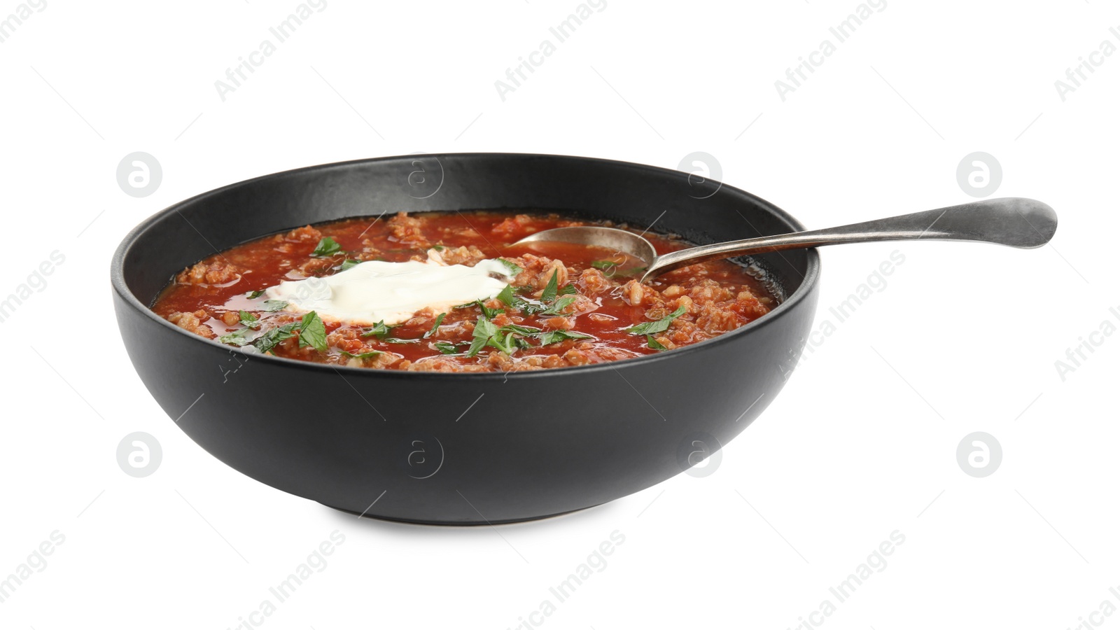 Photo of Bowl of delicious stuffed pepper soup on white background