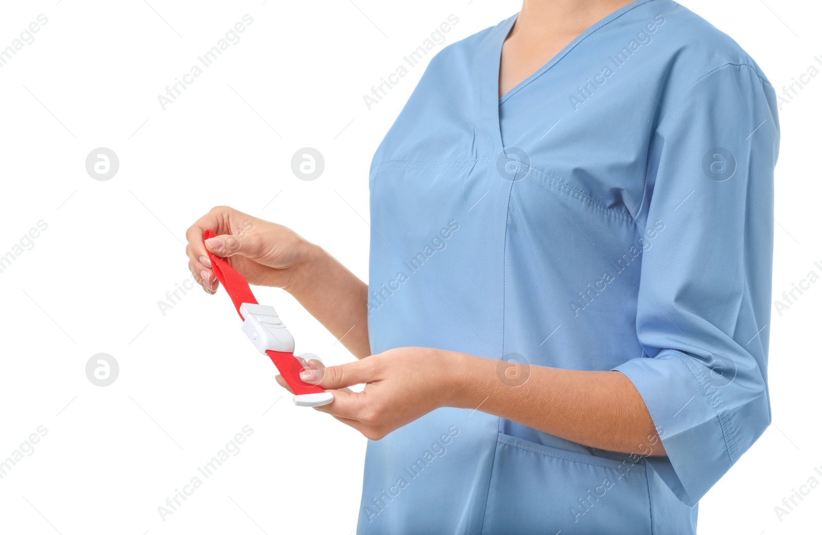 Photo of Female doctor holding tourniquet on white background, closeup. Medical object