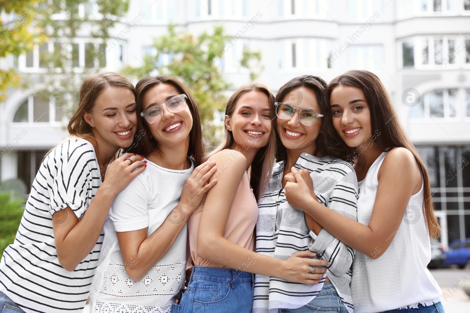 Photo of Happy women outdoors on sunny day. Girl power concept