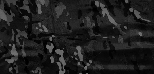 Image of Texture of camouflage fabric as background, black and white effect. Banner design