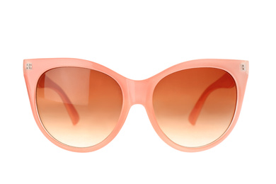 Photo of New stylish elegant sunglasses isolated on white
