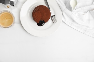 Photo of Delicious fresh fondant with hot chocolate served on white table, flat lay. Space for text