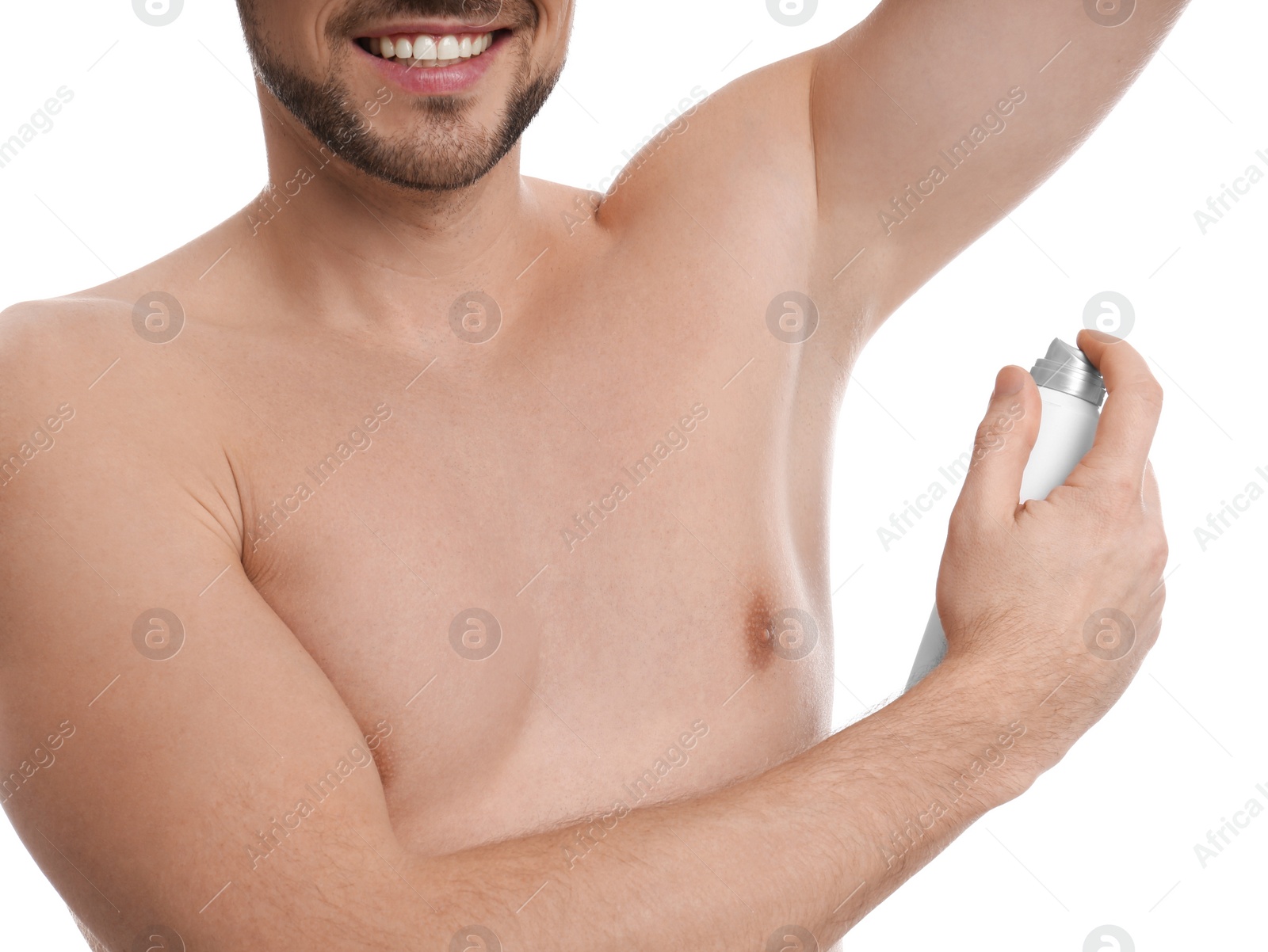 Photo of Man applying deodorant isolated on white, closeup