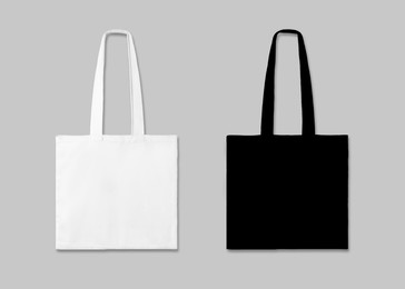 Image of Textile eco bags on light grey background, collage. Mock up for design