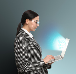 Facial recognition system. Woman using laptop on grey background 