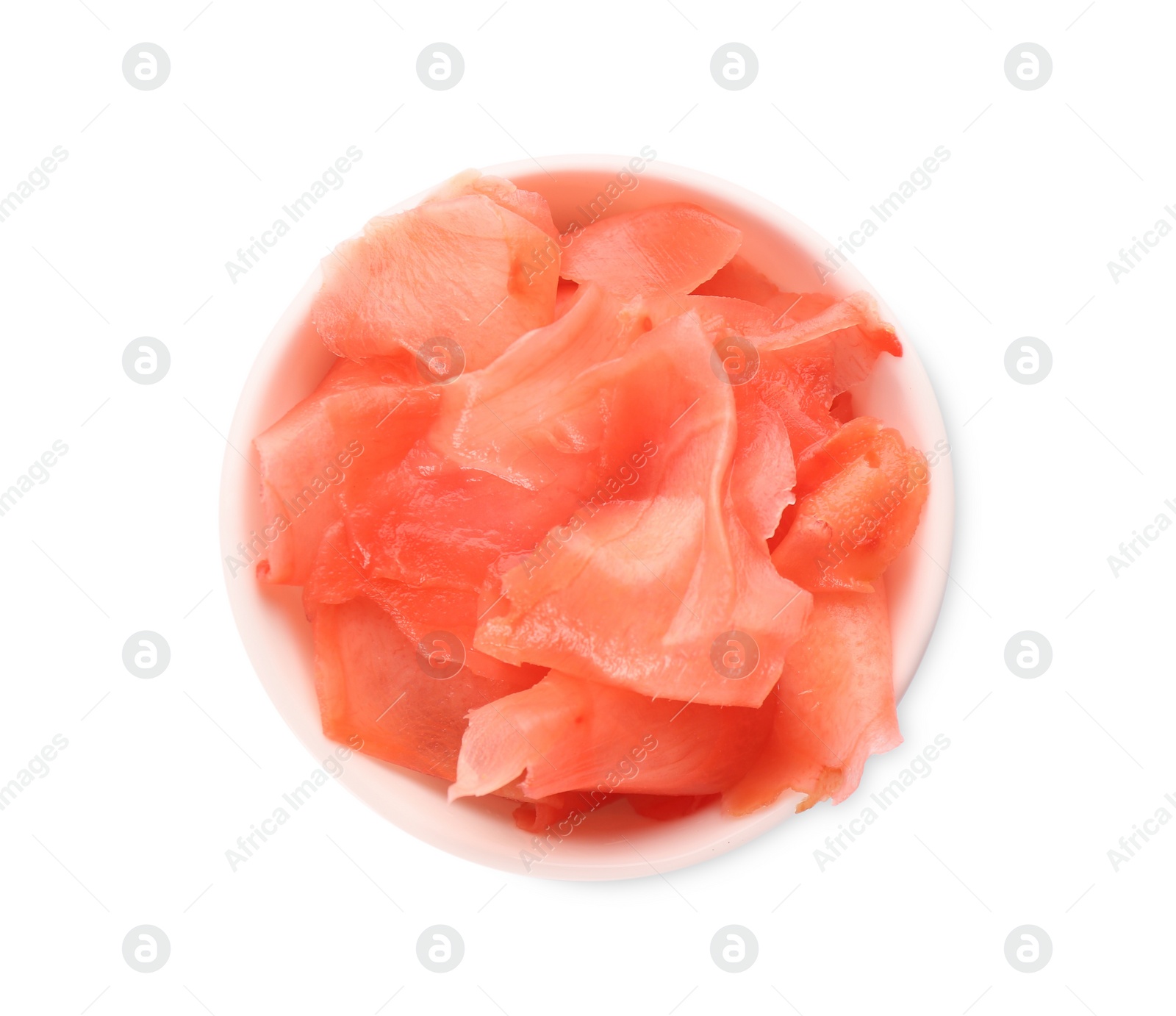 Photo of Pickled ginger in bowl isolated on white, top view