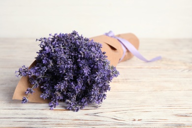 Beautiful lavender bouquet on white wooden table