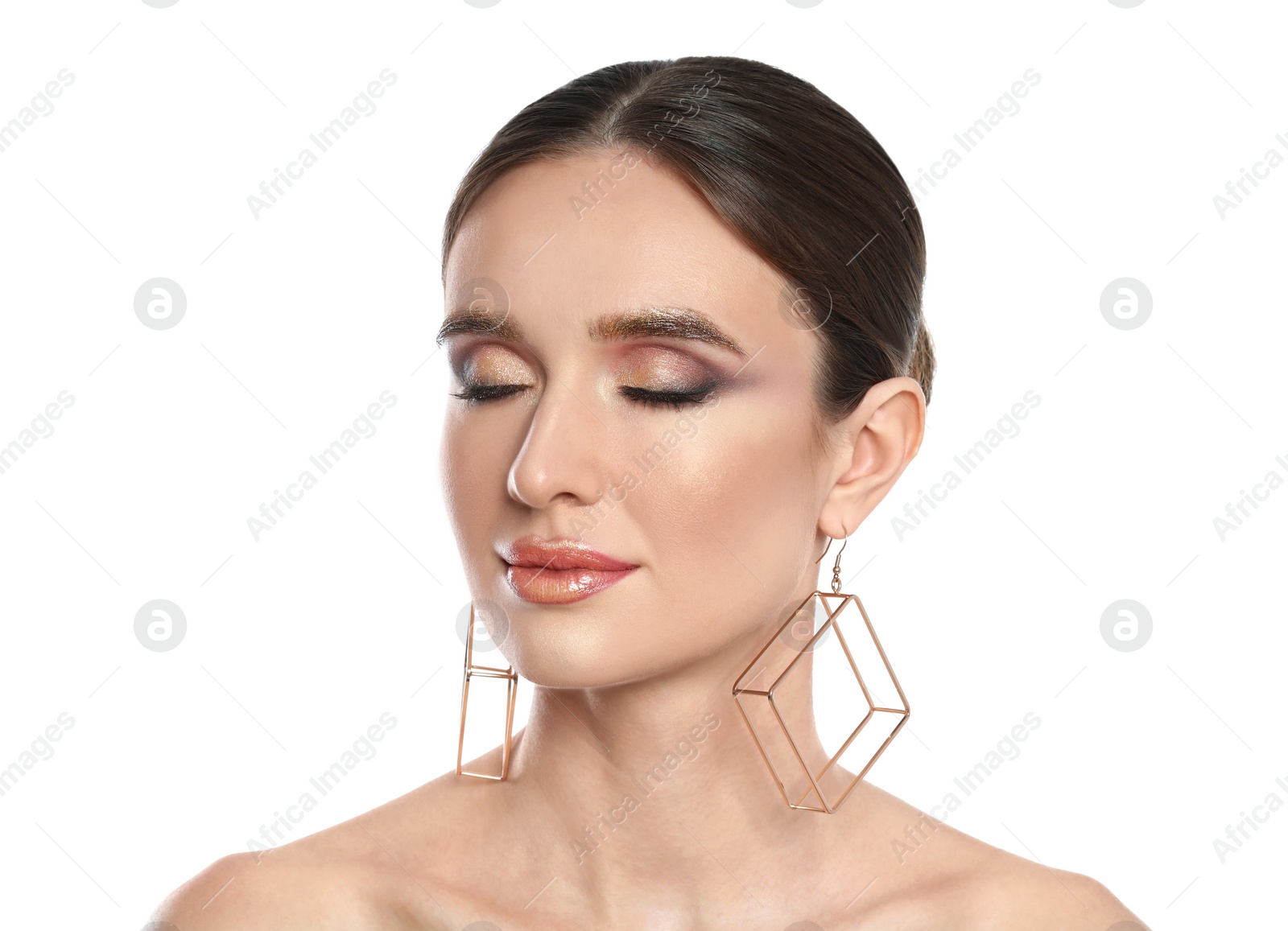 Photo of Beautiful young woman with glitter makeup on white background