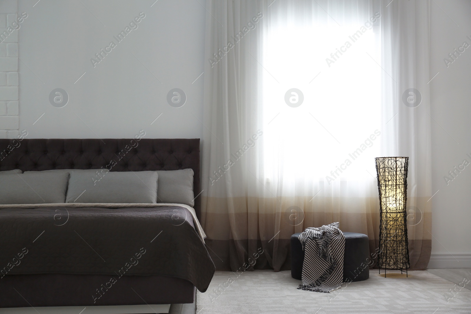 Photo of Contemporary room interior with comfortable double bed