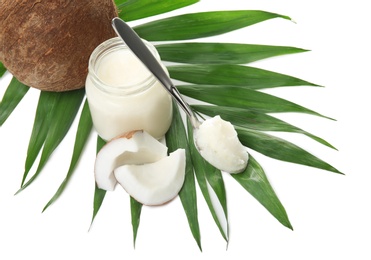 Photo of Beautiful composition with coconut oil and nuts on white background