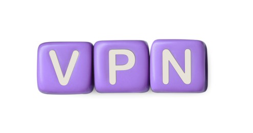 Photo of Lilac beads with acronym VPN on white background, top view