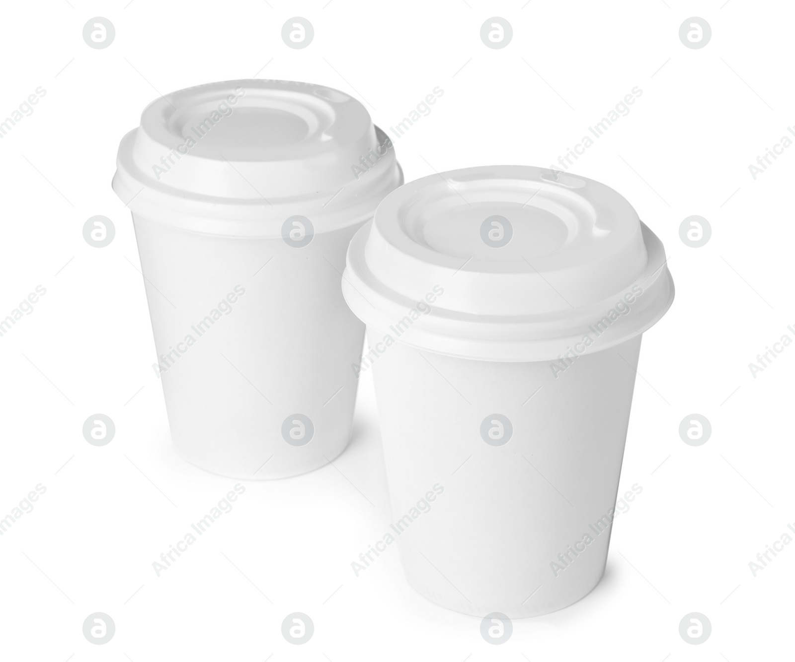 Photo of Takeaway paper coffee cups isolated on white