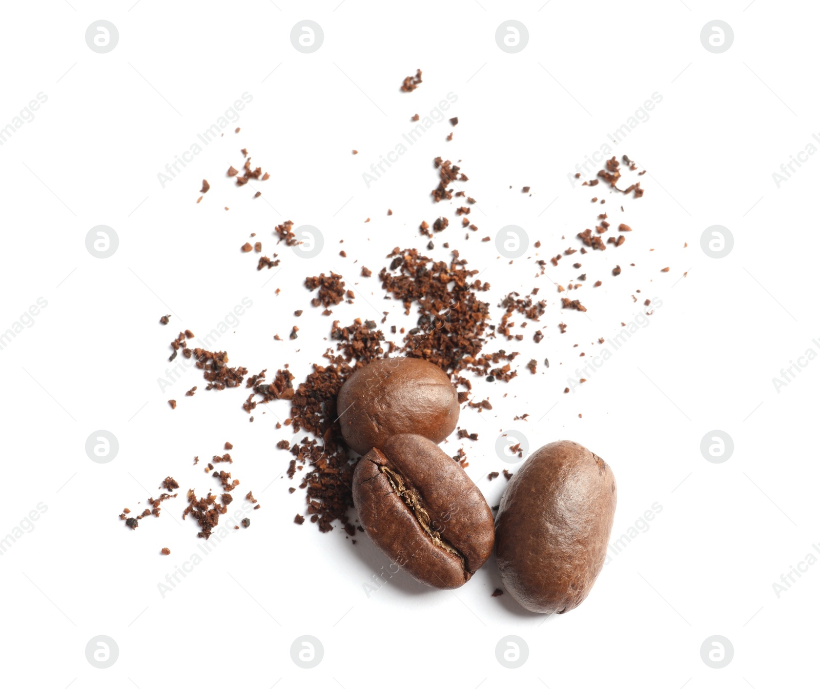 Photo of Coffee grounds and roasted beans on white background, top view