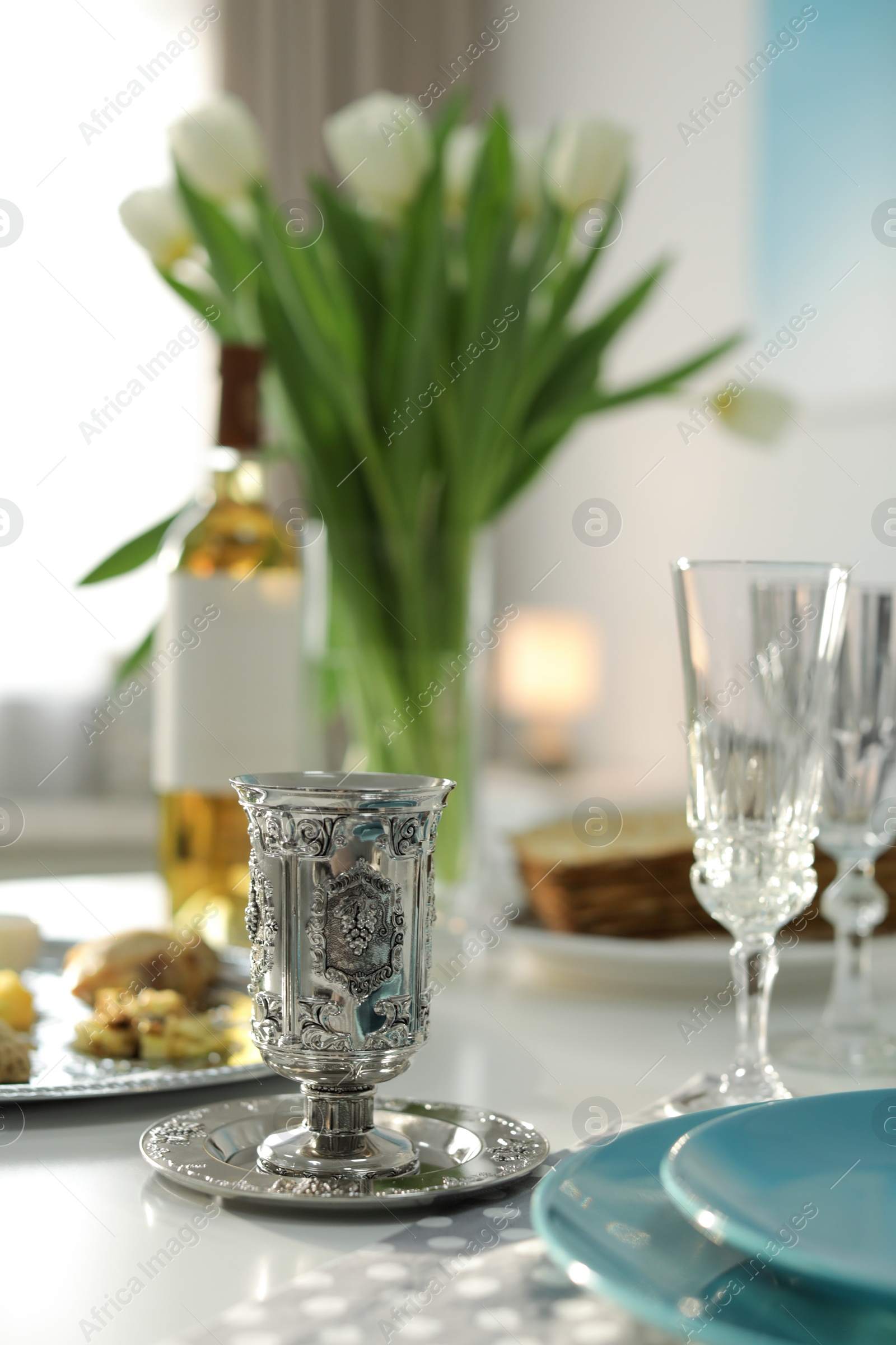 Photo of Table served for Passover (Pesach) Seder indoors