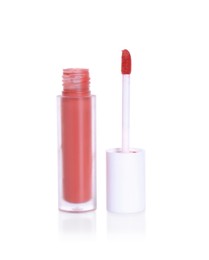 Lip gloss and applicator isolated on white. Cosmetic product