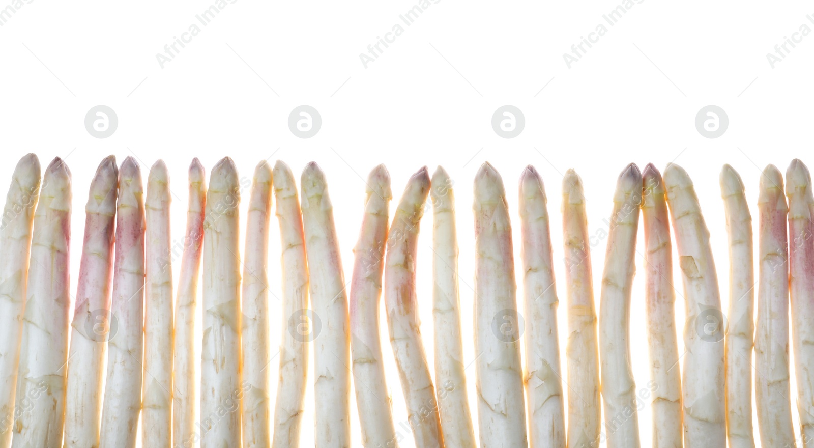 Photo of Fresh ripe raw asparagus isolated on white, top view