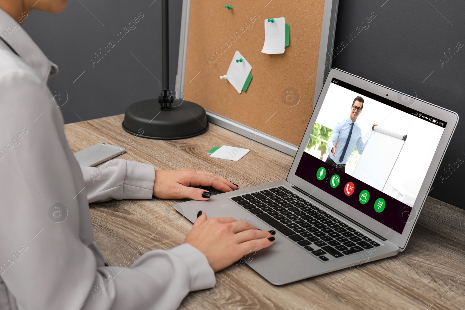 Image of Woman having online video consultation with business trainer at table, closeup