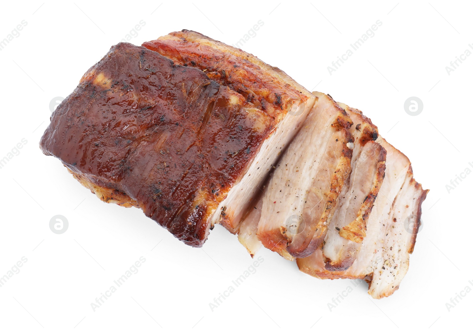 Photo of Pieces of tasty baked pork belly isolated on white, top view