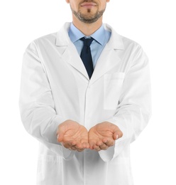 Male doctor showing open hands on white background, closeup