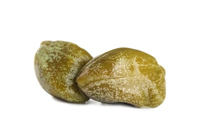 Photo of Two delicious pickled capers on white background