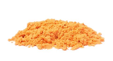 Photo of Pile of orange kinetic sand on white background