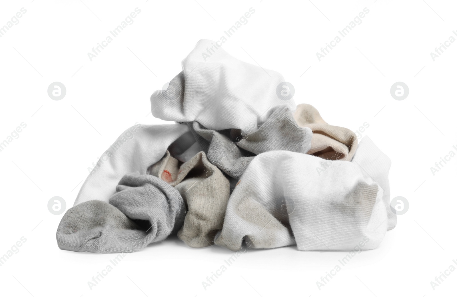 Photo of Different used dirty socks on white background