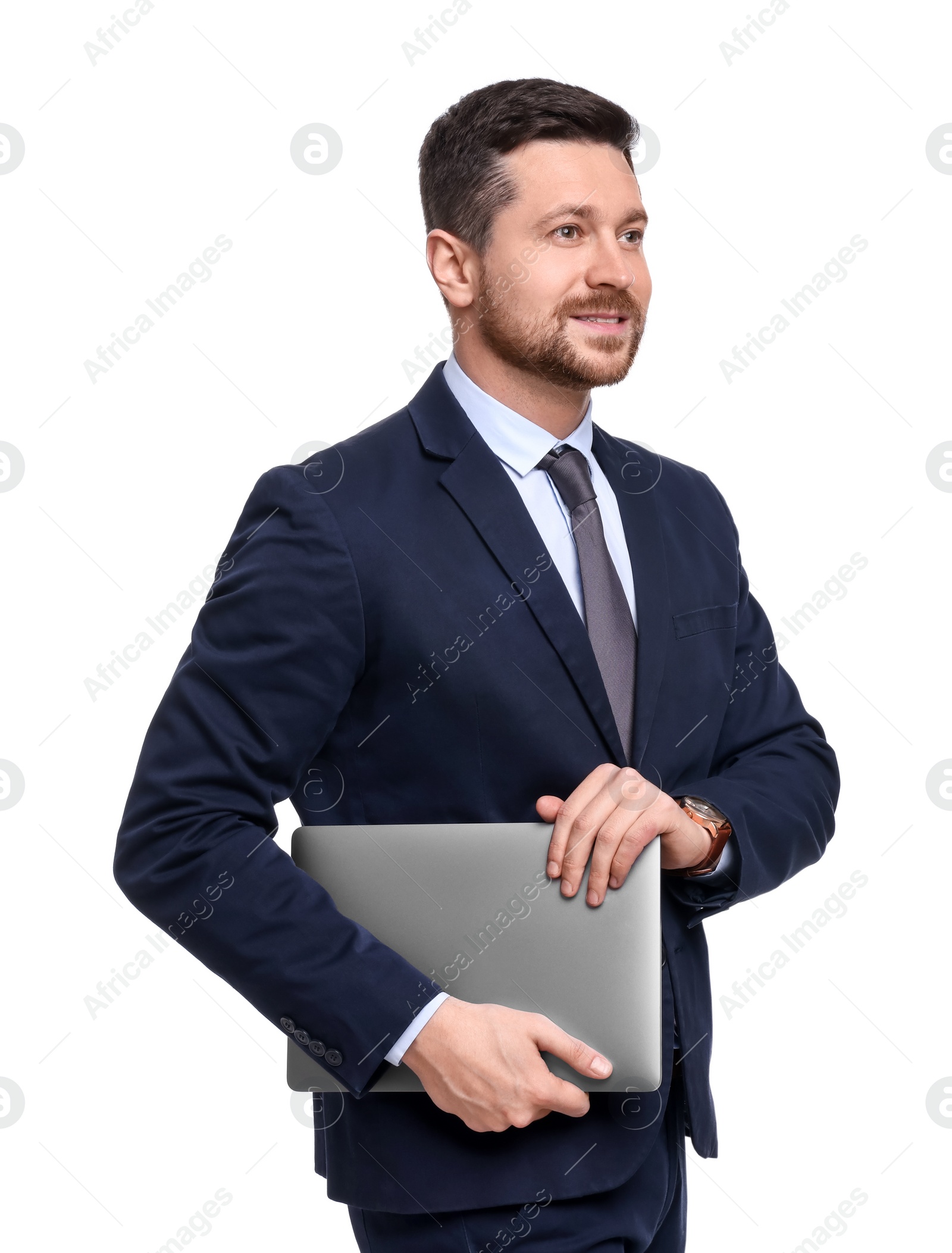 Photo of Handsome bearded businessman in suit with laptop on white background