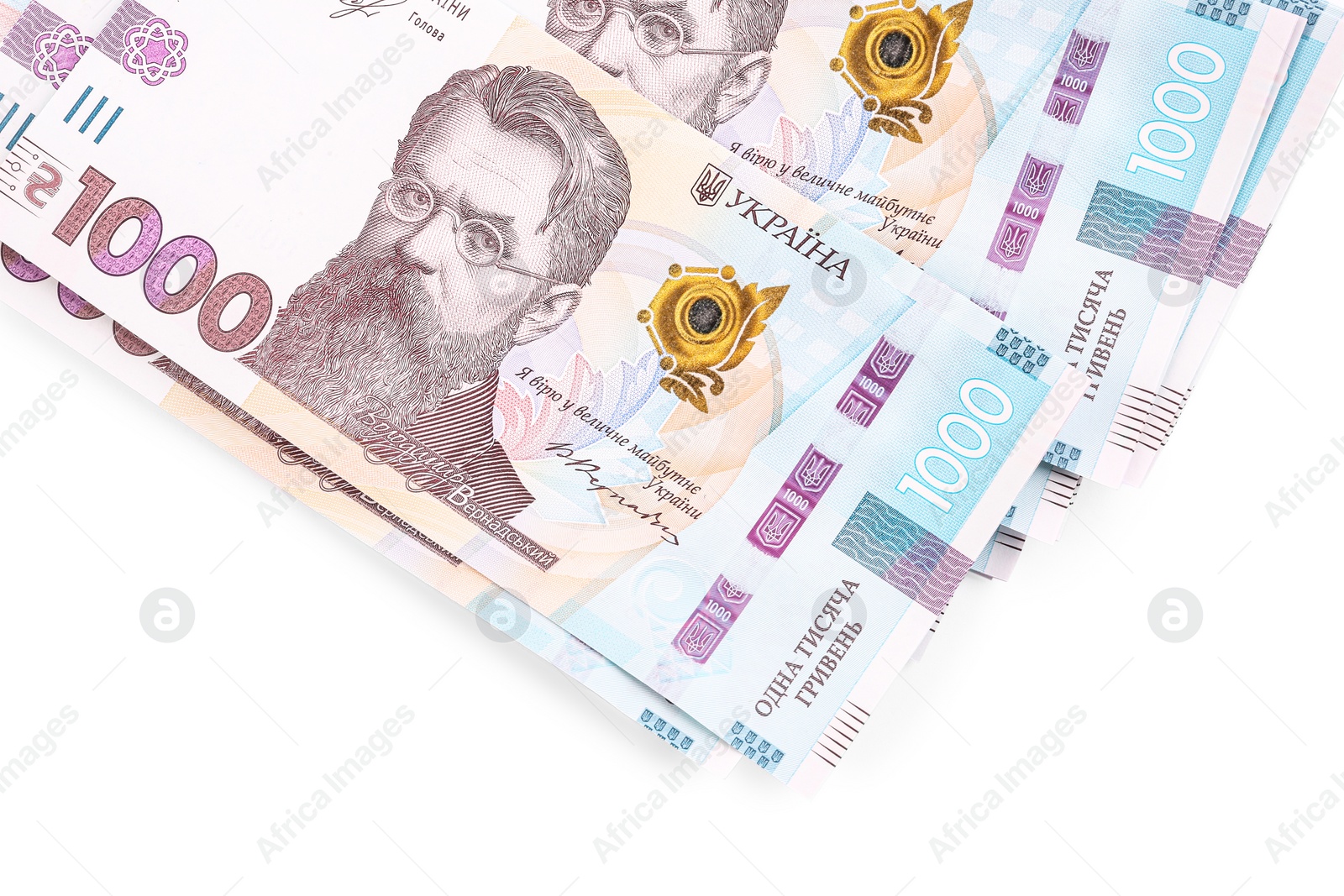 Photo of 1000 Ukrainian Hryvnia banknotes on white background, top view