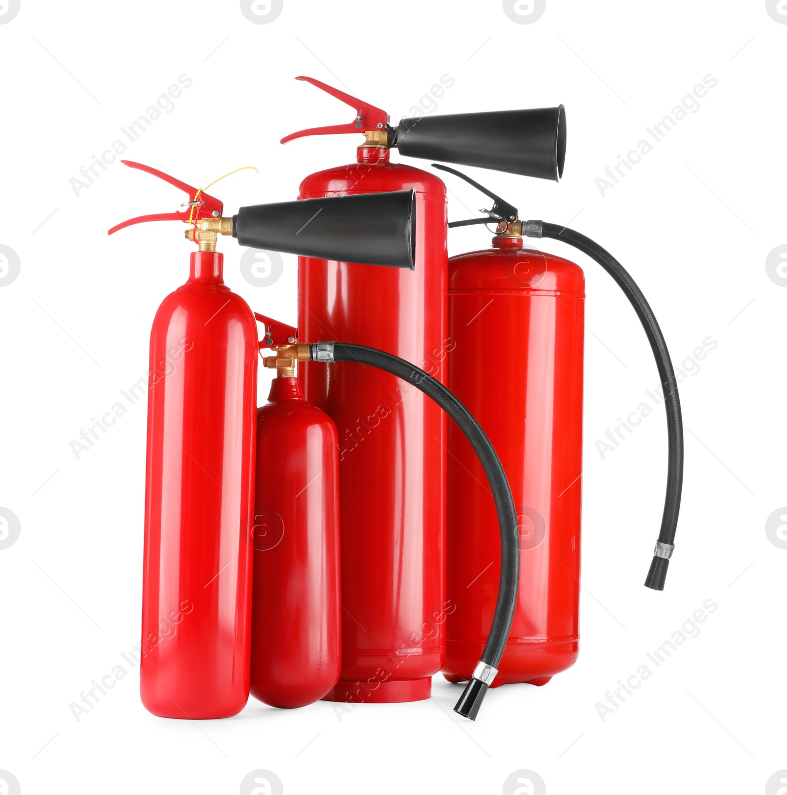 Photo of Many red fire extinguishers on white background