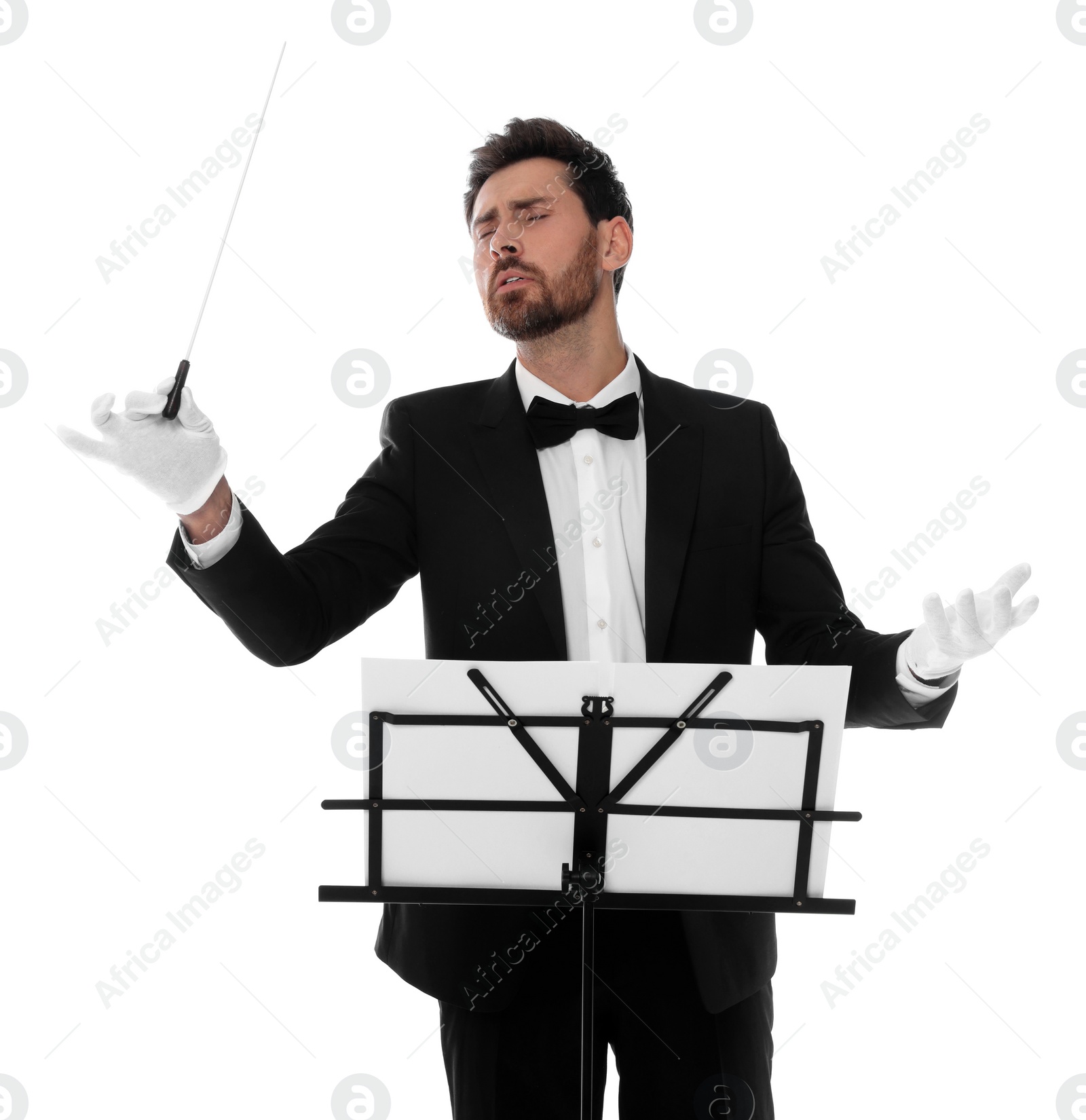 Photo of Professional conductor with baton and note stand on white background