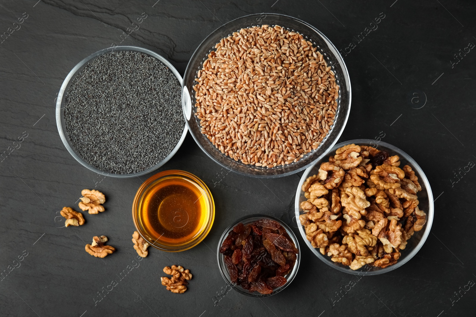 Photo of Ingredients for traditional kutia on grey table, flat lay