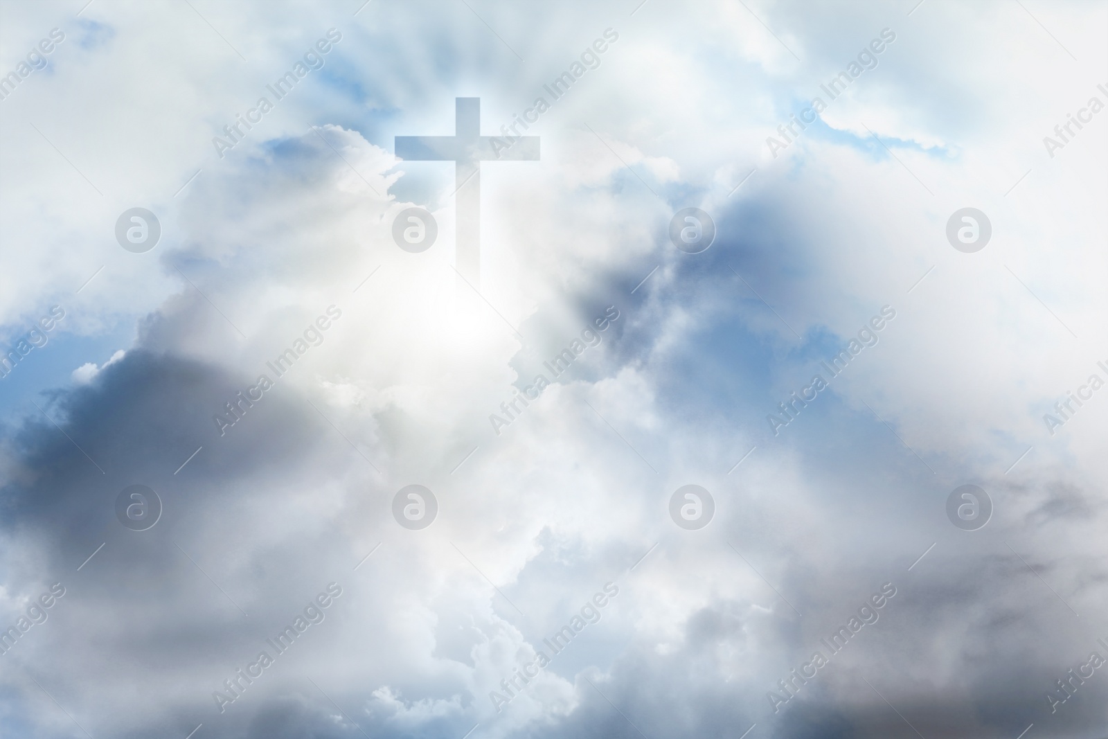 Image of Cross silhouette in sky with clouds. Resurrection of Jesus