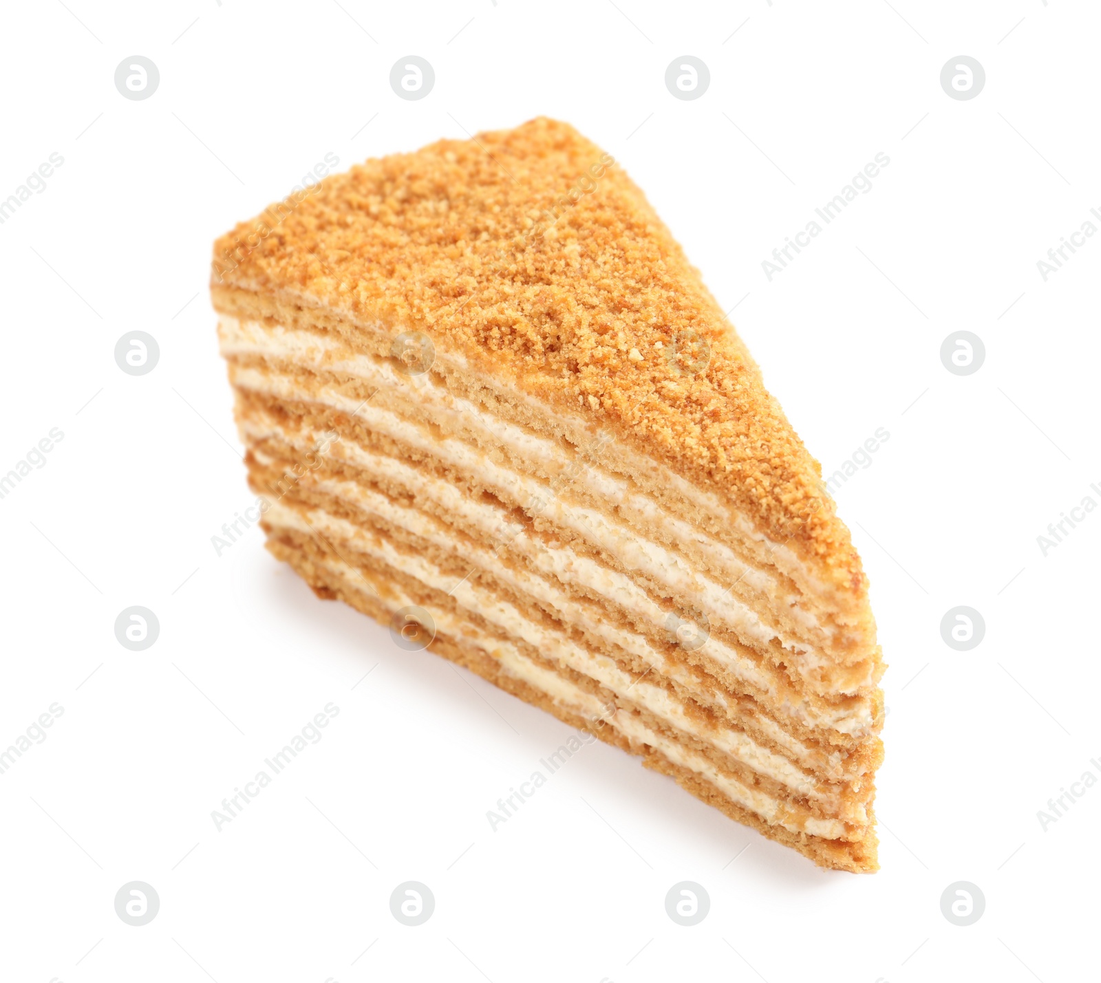 Photo of Slice of delicious honey cake isolated on white