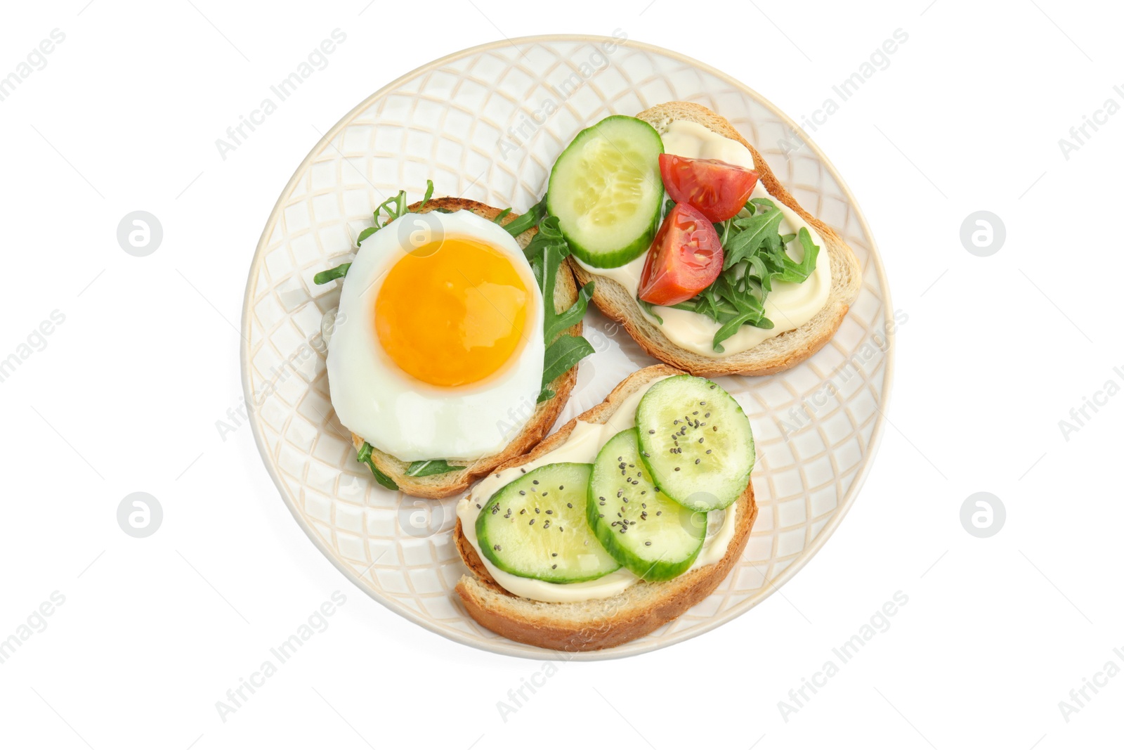 Photo of Slices of bread with different toppings on white background, top view