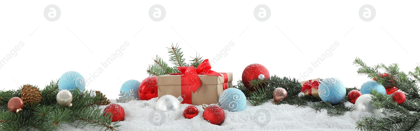 Photo of Fir branches, Christmas decoration and snow against white background